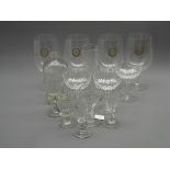 4 glass goblets with gilt decoration, measuring jug,