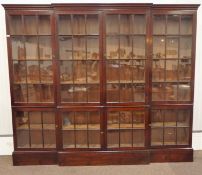 Early 20th century Georgian revival stained pine break front bookcase,