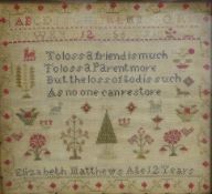 19th Century needlework sampler by Elizabeth Matthews aged 12 years with alphabet numerals and