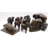 Two Eastern carved elephants, carved ape, birds,