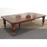 Large Victorian mahogany extending dining table, rectangular moulded top having rounded corners,