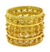 Ethiopian 22ct gold (tested) filigree design ring, approx 8.