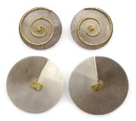 Pair of Greek silver and 18ct gold, spinning swirl circular stud earrings, stamped 925,