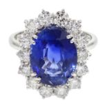 18ct white gold oval sapphire and diamond cluster ring hallmarked, sapphire approx 5.