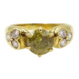 18ct gold European cut irradiated canary yellow diamond ring, either side set with three diamonds,