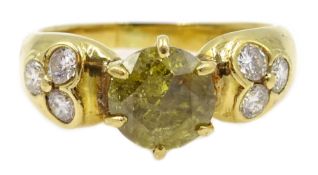 18ct gold European cut irradiated canary yellow diamond ring, either side set with three diamonds,