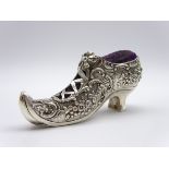 Edwardian silver pin cushion in the form of a shoe with pierced and embossed decoration 11cm x 5.