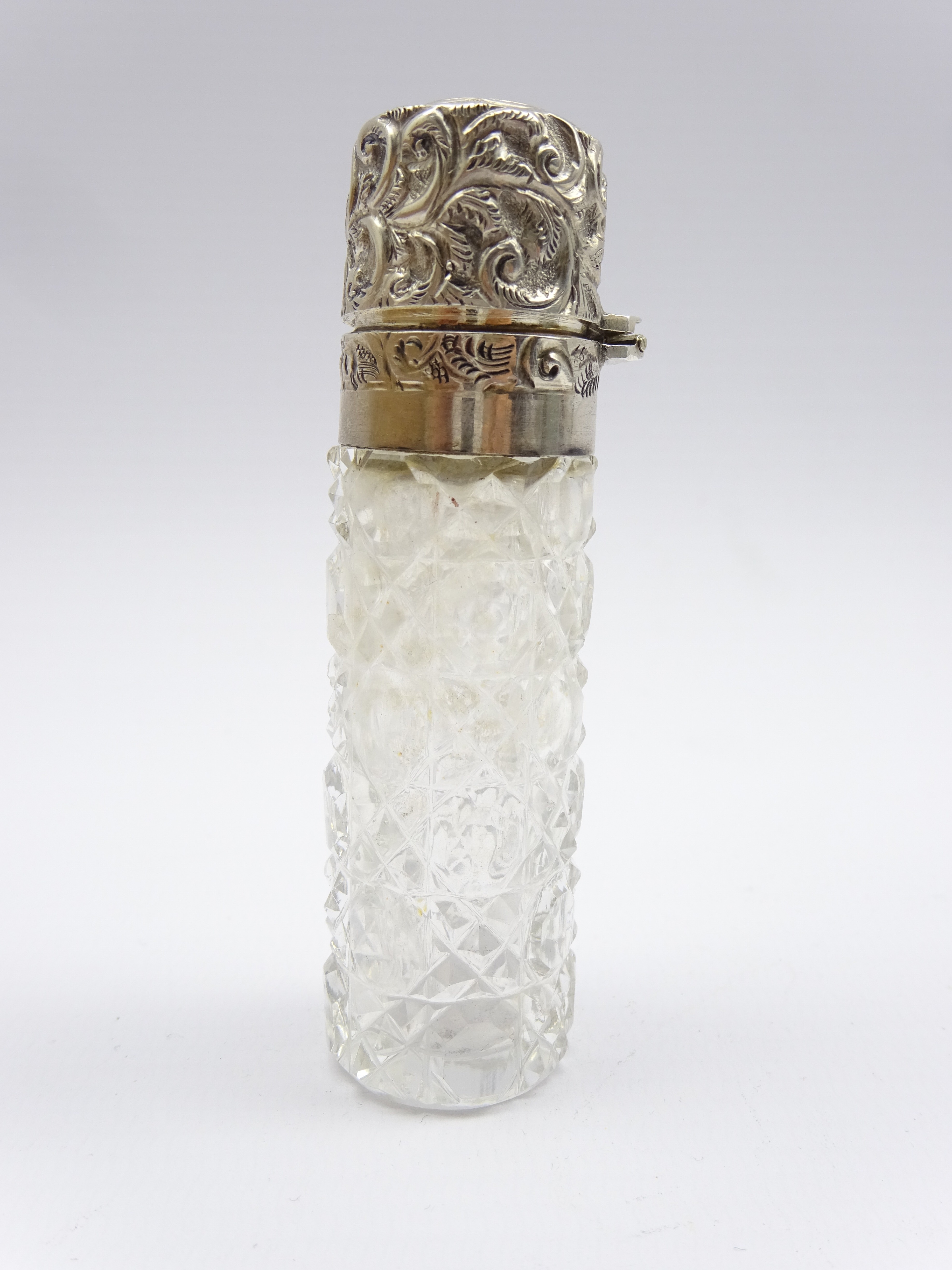 Victorian silver mounted cut glass scent bottle with embossed decoration H8cm Birmingham 1892 Maker