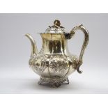 William IV silver teapot with embossed floral decoration,