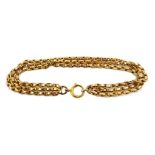 Gold three chain link bracelet, stamped 9c, approx 11.