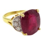 18ct gold oval ruby ring, with three diamonds set each side, hallmarked, ruby approx 10.