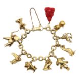 Gold bracelet with seven Hans Georg Mautner gold animal charms,