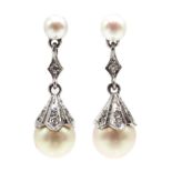 Pair of 9ct white gold, cultured pearl and diamond pendant earrings,