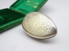 Silver vinaigrette of ovoid shape with engraved border,