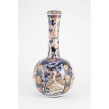 C19th Imari Bottle Vase spherical body painted with carp and dragons with florals in traditional