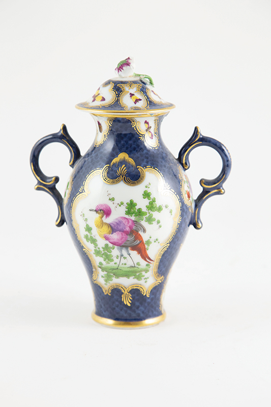 Worcester Handled Vase and Cover painted with exotic birds in cartouche on scale blue ground