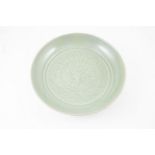 Chinese Celadon Shallow Dish stylised floral spray to surface as in the Yuan Dynasty manner 34cm