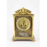 French All Gilt Brass Cased Mantel Clock balloon dial flanked by architectural pillars, presentation