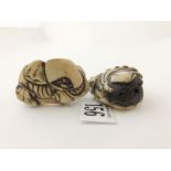 Two Netsuke seashell and shells with hermit crab