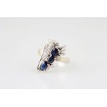 18ct White Gold 24Stone Sapphire & Diamond Ring raised cage claw set three mid blue sapphires with