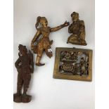 Antique Three Carved Wooden Temple Figures and panel carved in high relief, floral vase and emblems