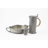 Archibald Knox Lidded Pewter Jug cylindrical shape, rattan bound handle, design number 0280,