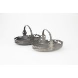 Pair Of Archibald Knox Tudric Pewter Baskets oval shape with fixed handles and pierced stylised