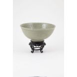 Chinese Celadon Bowl in the Sung Dynasty manner with very shallow floral decorations, restored