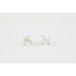 Pair Single Diamond Stud Earrings each four claw set with round brilliant cut approx 1.45cts tdw,