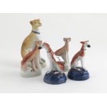 Pair Small Victorian Staffordshire Hounds with other pair and single painted bisque hound