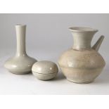 Sawankhalok Oil Pot together with lidded pot and specimen vase all with a white celadon glaze (oil