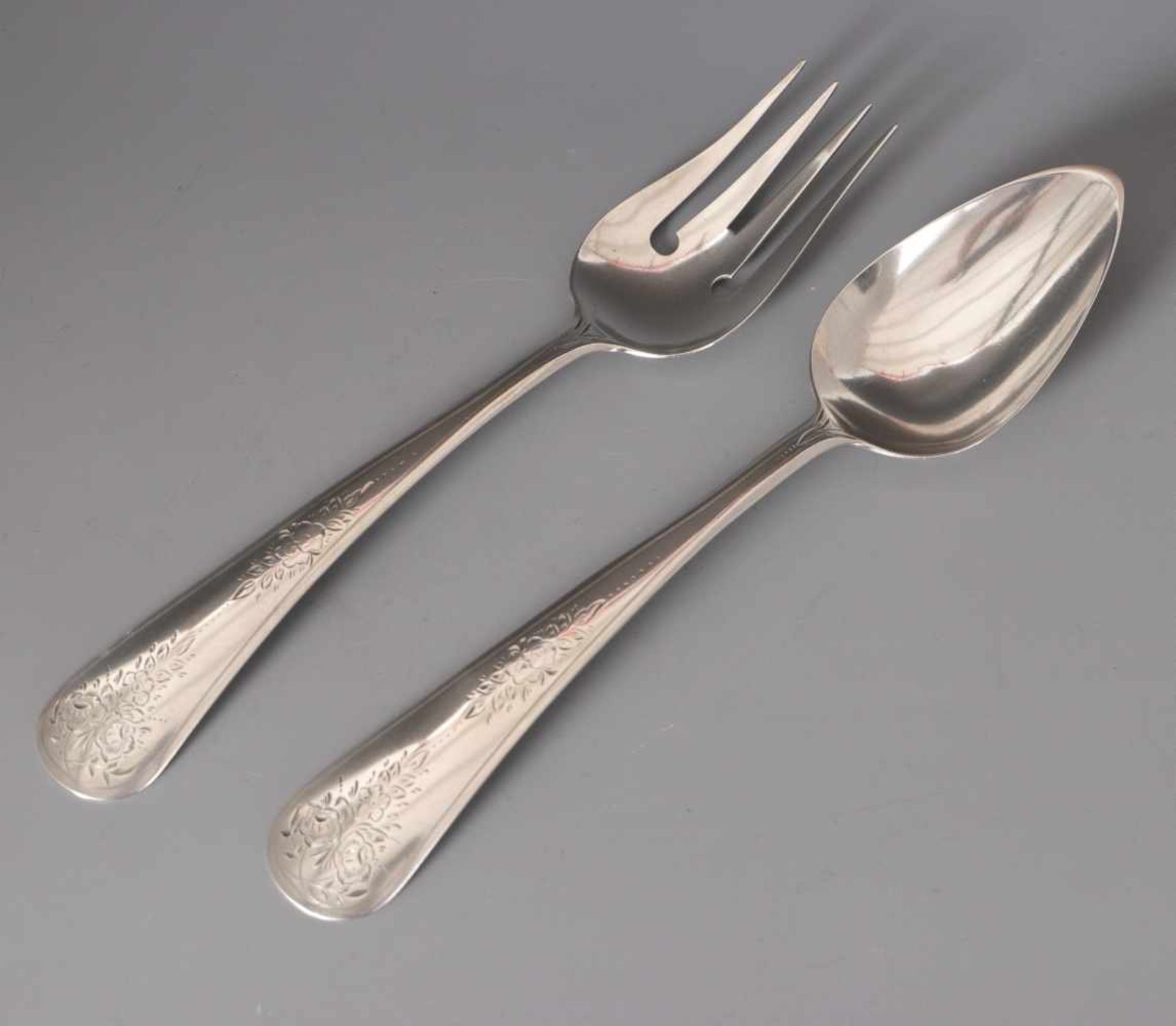 A Silver salad serving fork and spoon, dated 1884A Silver salad serving fork and spoon, dated