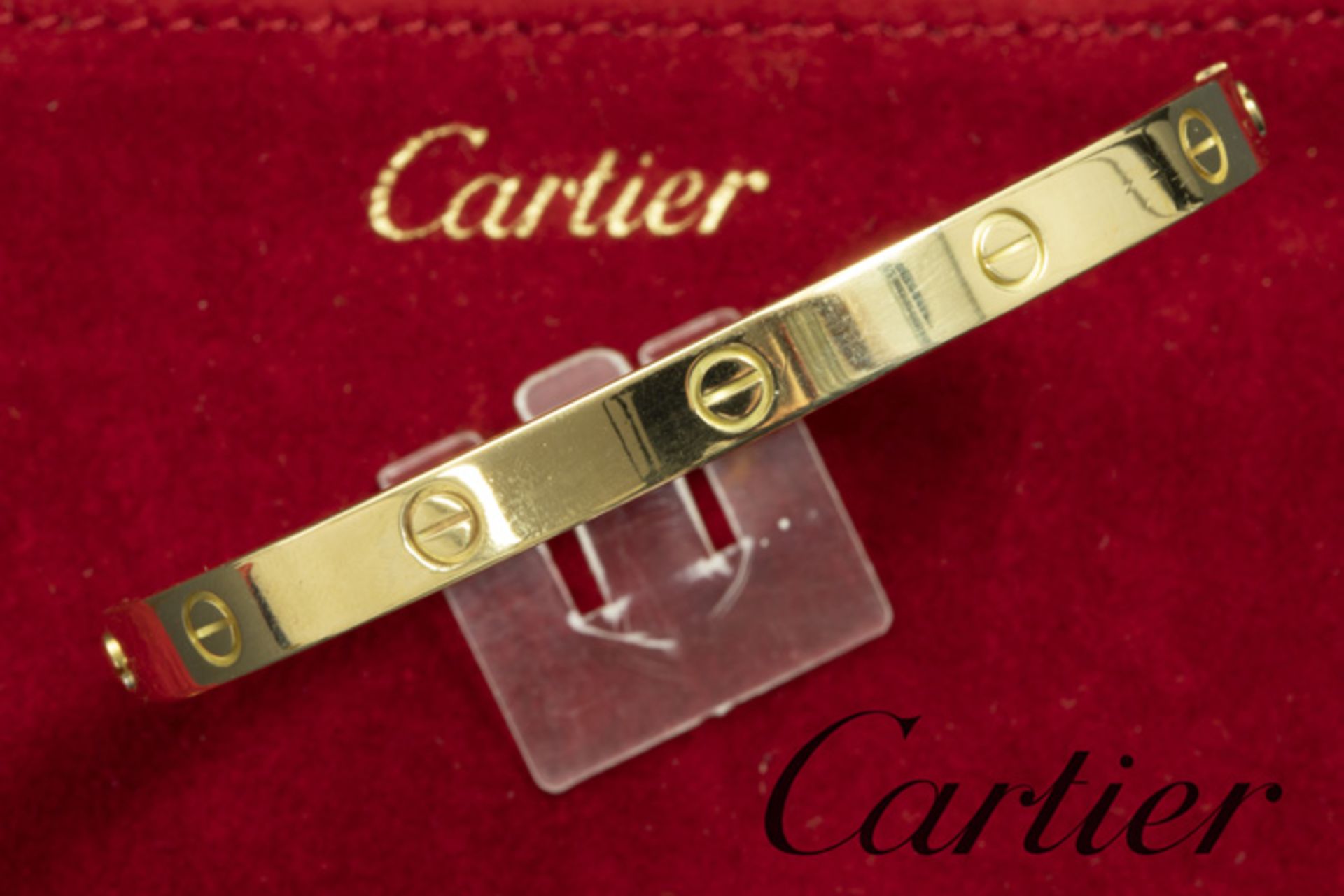 CARTIER origineel bracelet uit de "Love Collection" met een esclavemodel met typische [...]