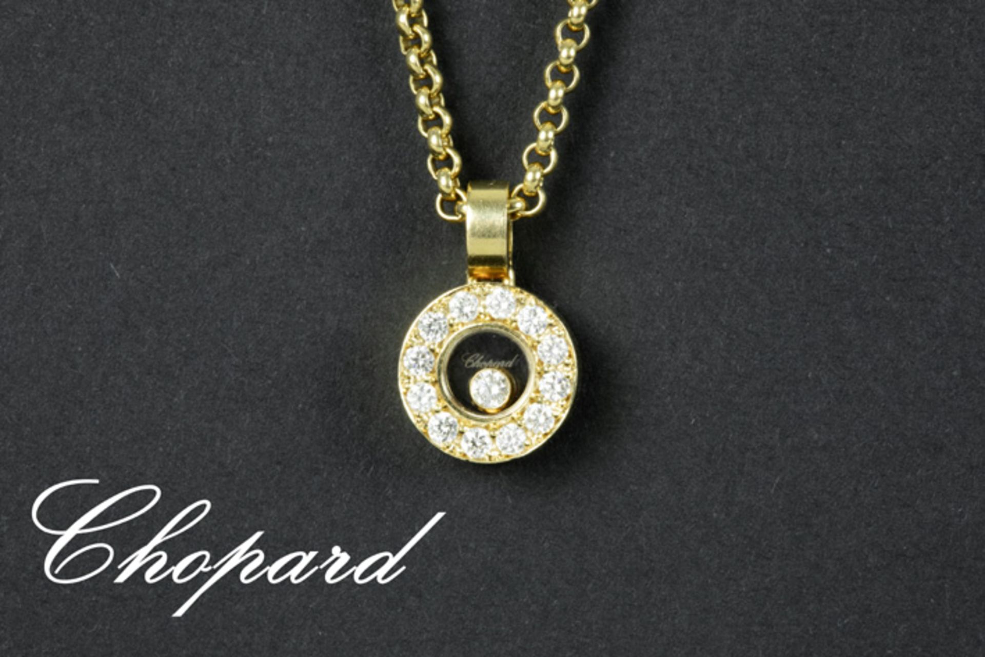 CHOPARD ronde "Happy Diamonds"-pendatief in geelgoud (18 karaat) bezet met ca 0,40 [...]