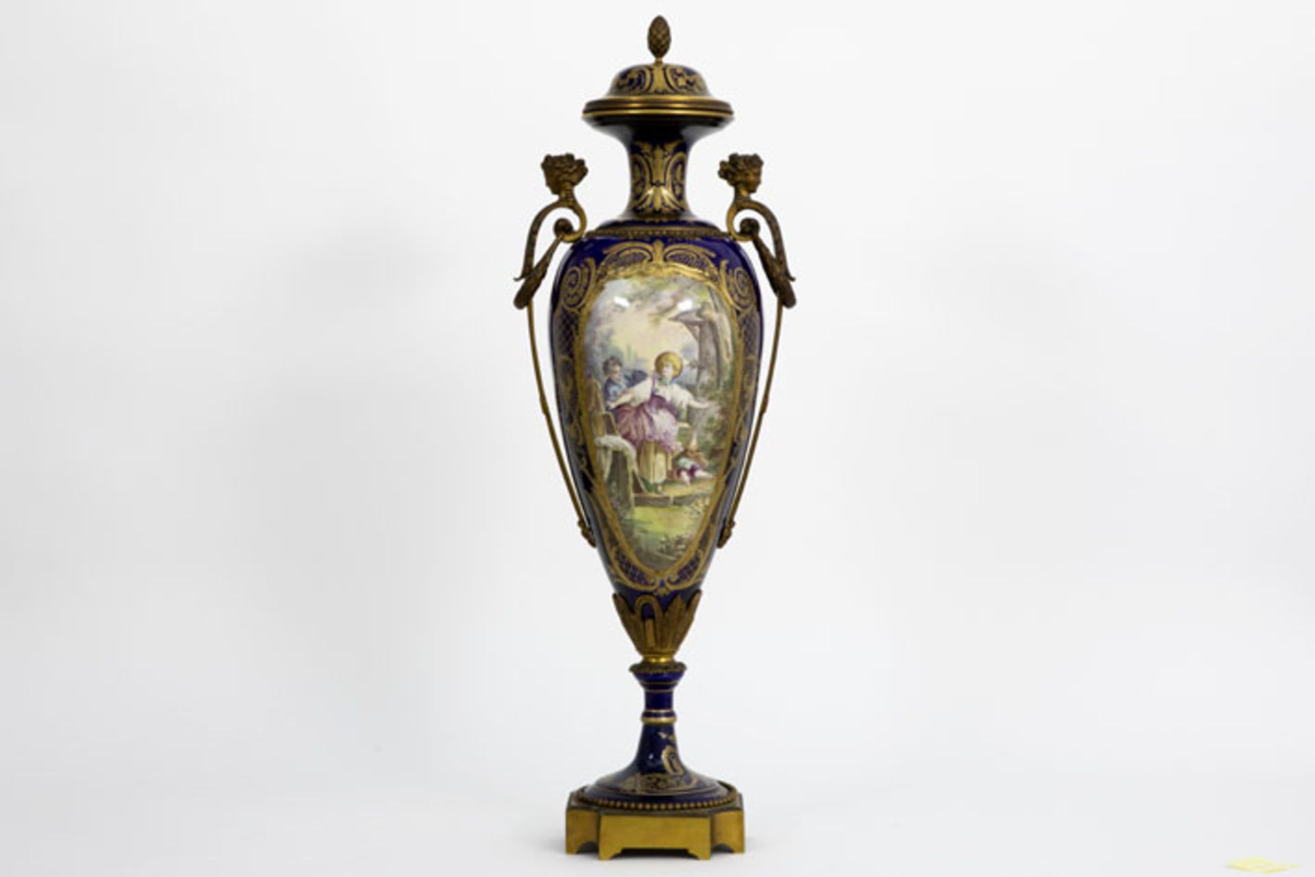 quite big vase in Sèvres porcelain with bronze mounting and with paintings, signed [...]