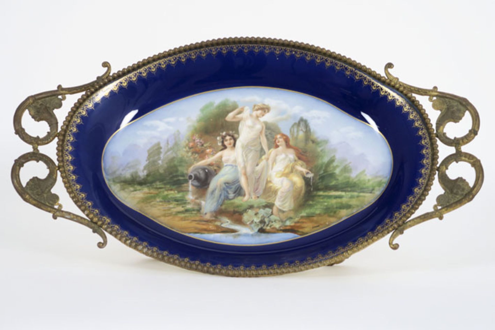 antique French dish in marked Sèvres porcelain with signed painting and a bronze [...]