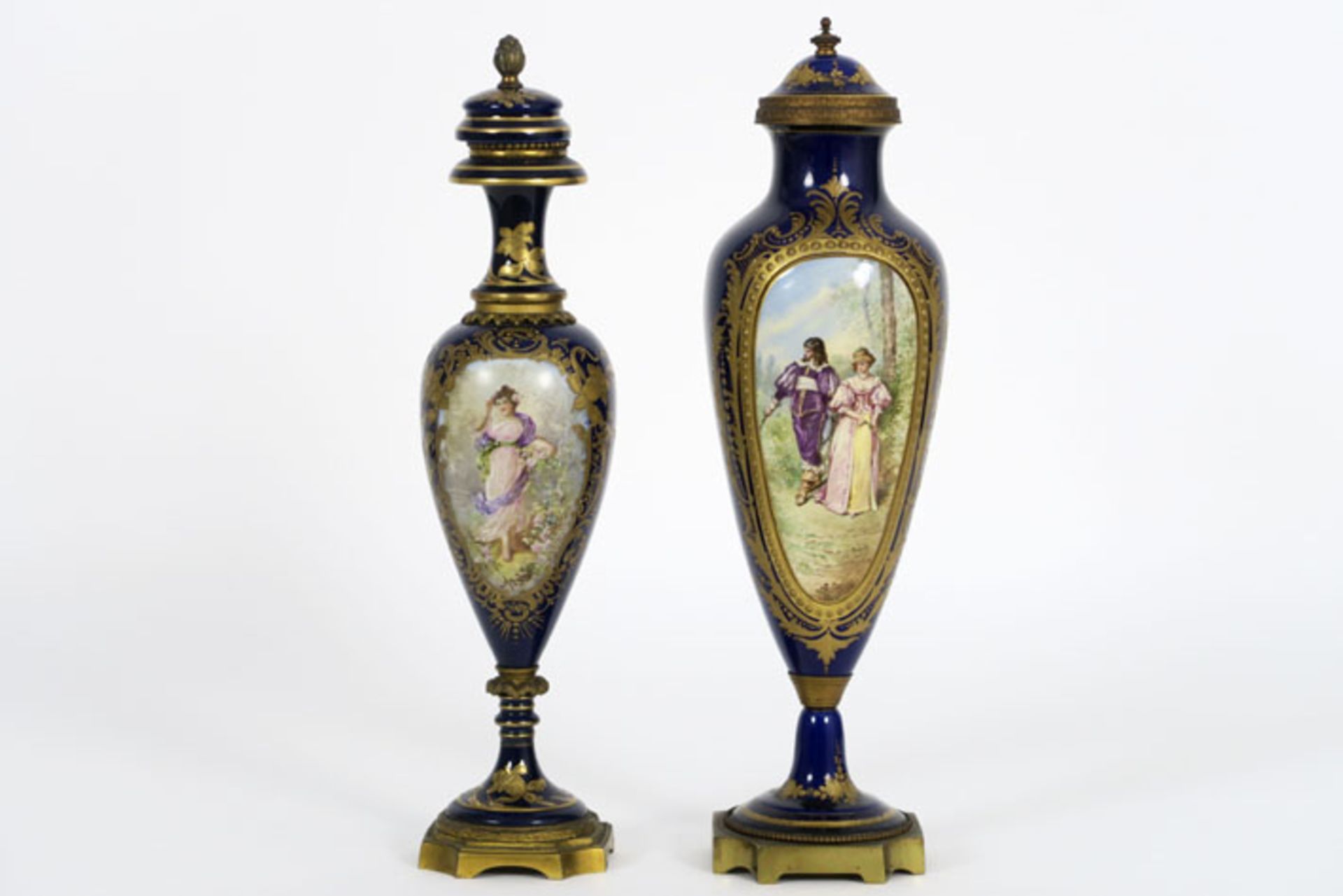 two antique lidded vases in "Sèvres" porcelain with bronze mountings - - Lot (2) [...]