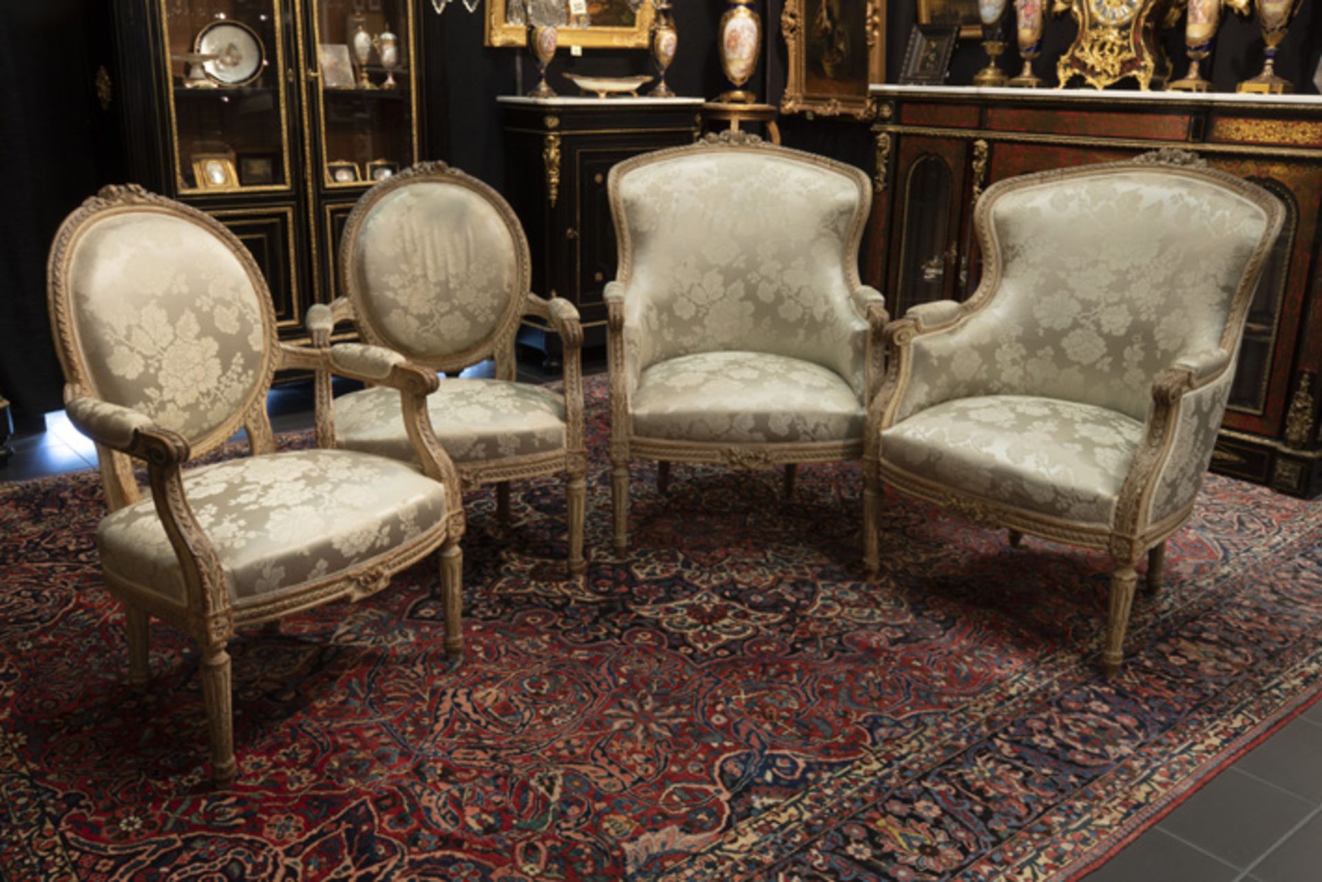 antique Louis XVI style salon suite with two pairs of armchairs - - Antiek [...]