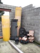 Assorted plastic piping including bases, shafts, etc., 2 x plastic rubbish chutes. Located The