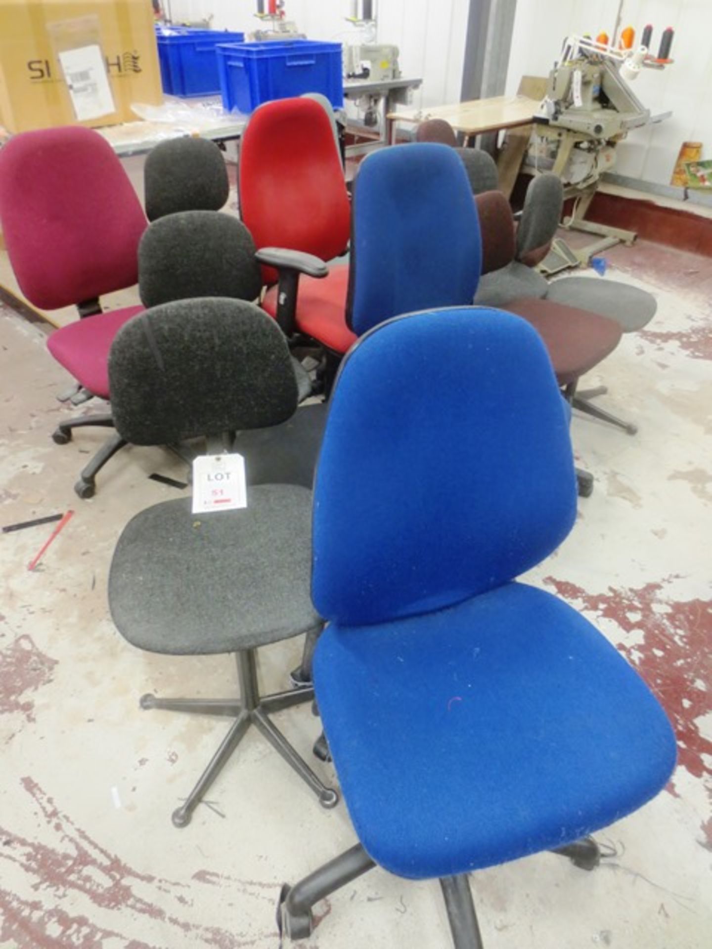 Fourteen assorted cloth upholstered chairs