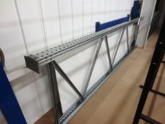 Two bays of stee lframe clothes/stock rails, approx 2700 x 4100 x 1050mm per bay (currently