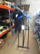 Two assorted mobile clothing rails (excl all contents)