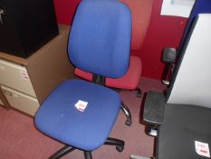 Two assorted cloth upholstered swivel chairs