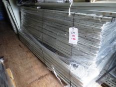 A pallet of adjustable steel racking uprights and quantity of rectangular steel shelves (as