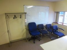 Four various blue cloth upholstered chairs, steel stand, wall mounted whiteboard