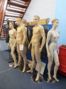 Seven various mannequins, with stands