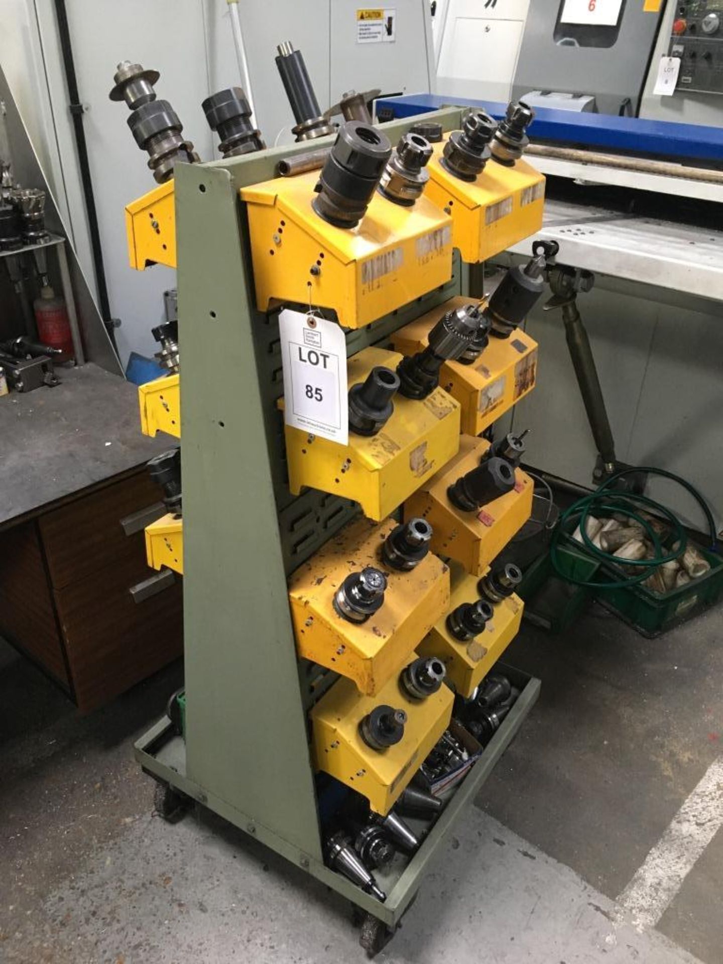 A quantity of CNC tool holders and a mobile unit