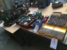 A quantity of collets, tool holders, chuck jaws and drill bits