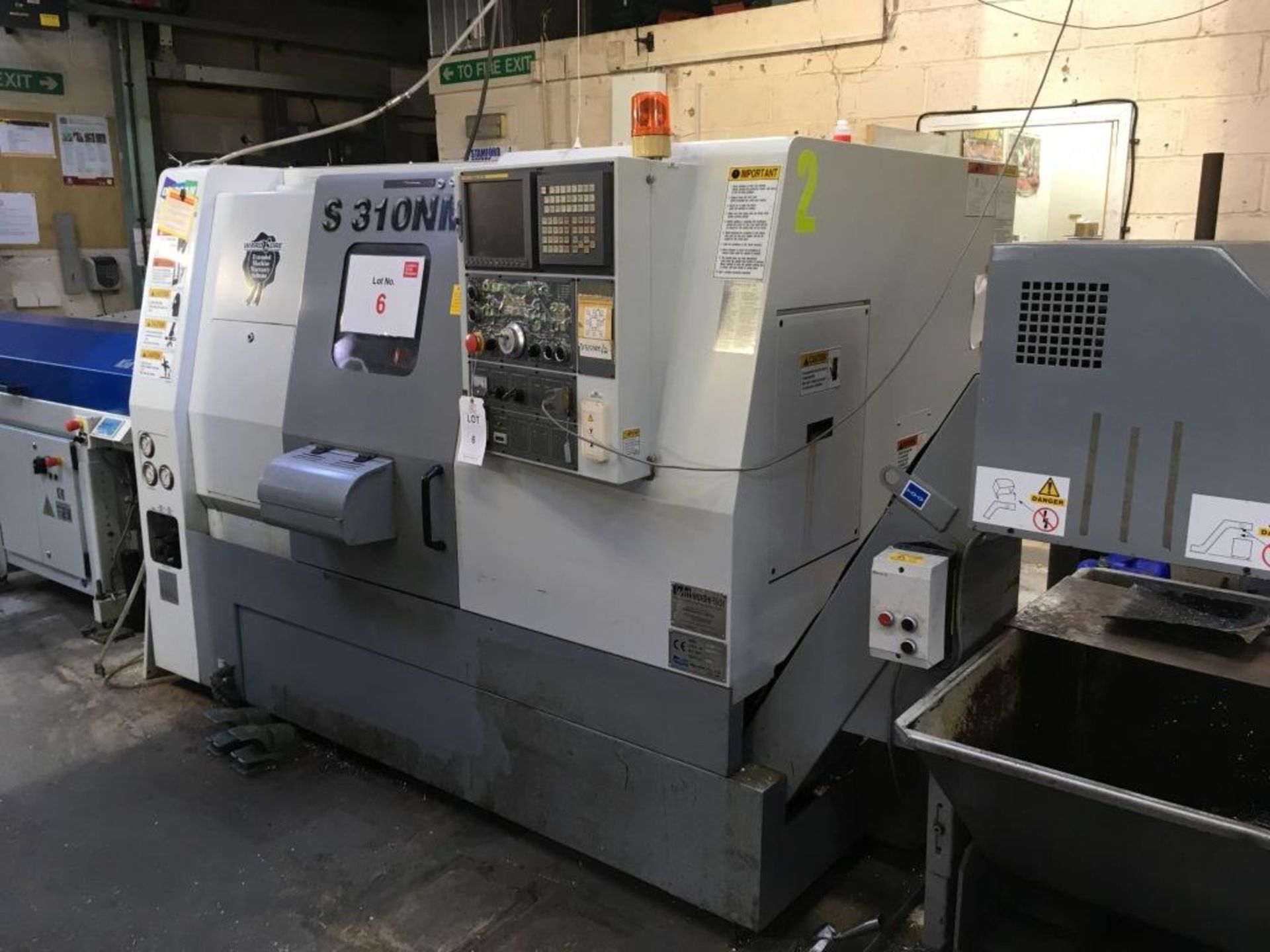 Doosan Mecatec S310NM CNC lathe with FANUC Series 21i TB control and 12 tool changer, Serial No.