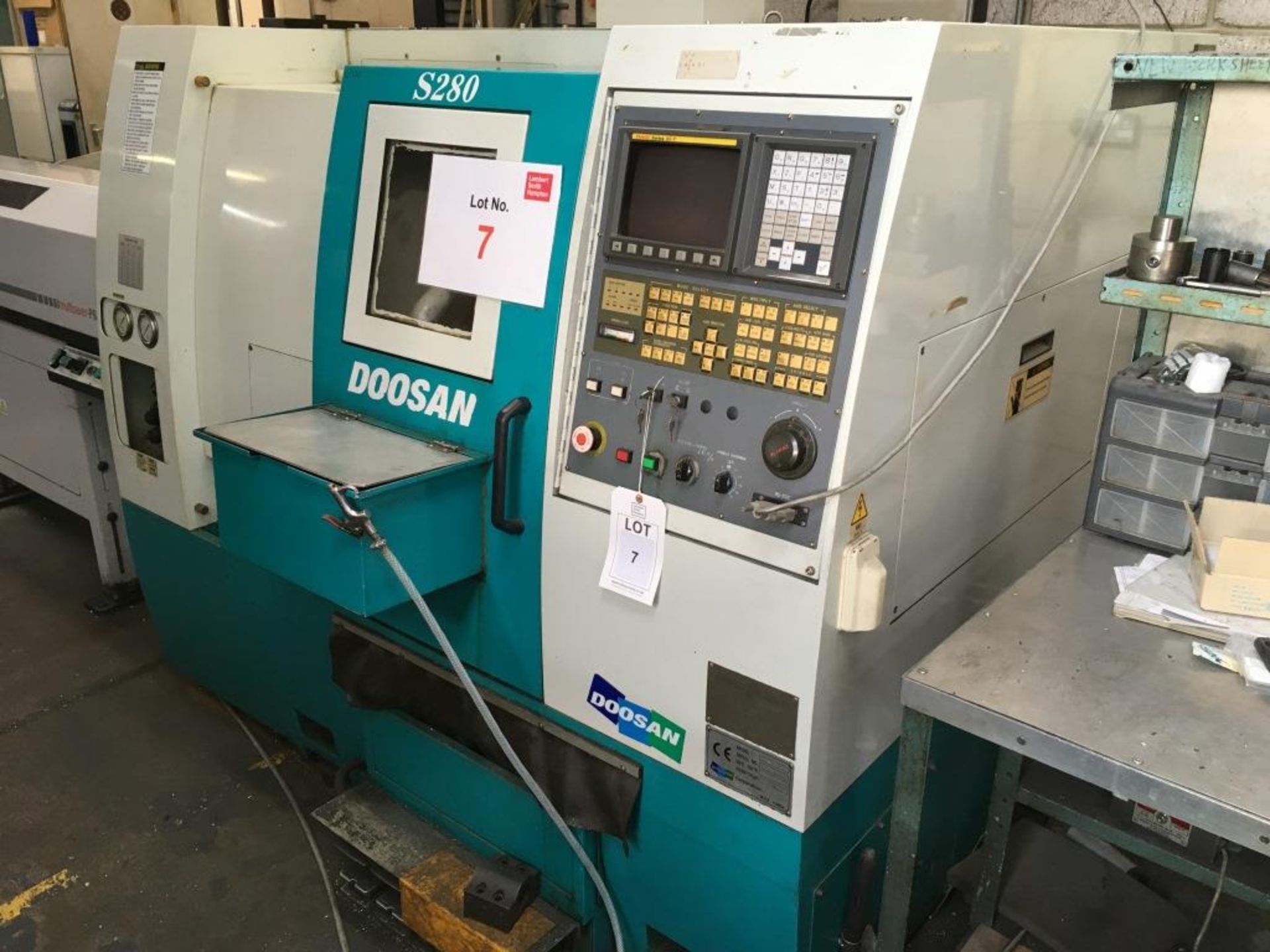 Doosan S280 CNC lathe with FANUC Series Oi-T control, 10 tool changer, Serial No. LNG-1142 with